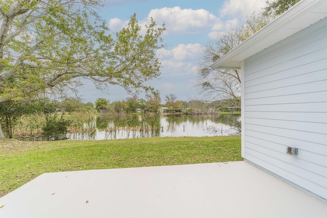 view of patio featuring a water view