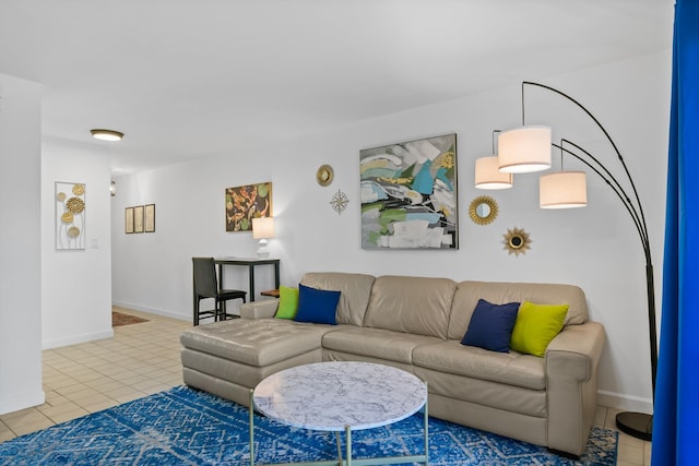 living room with tile patterned flooring