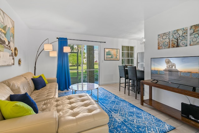 living room featuring light tile patterned flooring