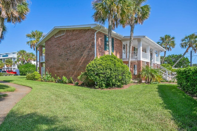 view of property exterior with a lawn