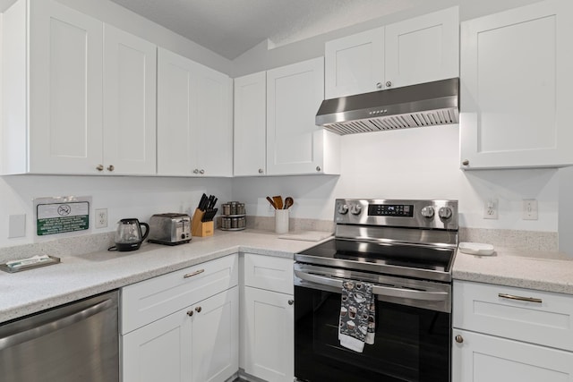 110 Dory Rd, Saint Augustine, FL 32086 - kitchen featuring stainless steel appliances, range hood, white cabinetry, and light stone countertops