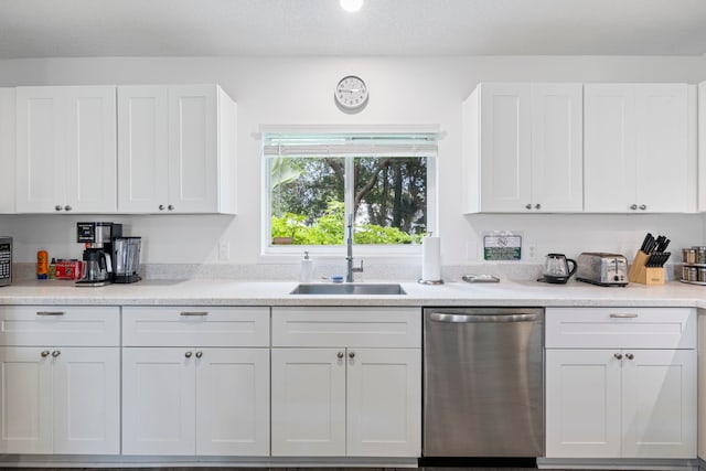 110 Dory Rd, Saint Augustine, FL 32086 - kitchen with appliances with stainless steel finishes, a sink, white cabinets, and light countertops