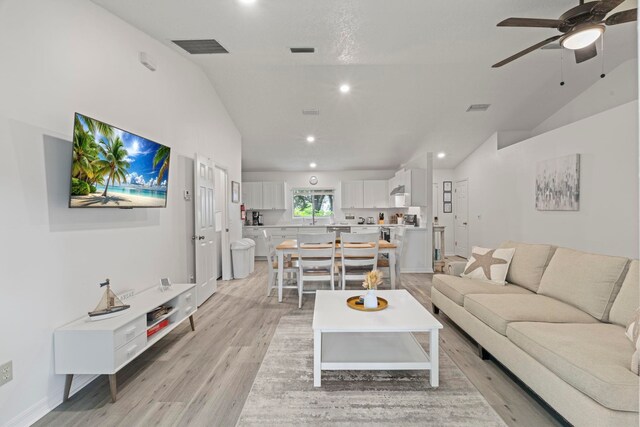 110 Dory Rd, Saint Augustine, FL 32086 - living area with vaulted ceiling, ceiling fan, recessed lighting, and light wood-style floors