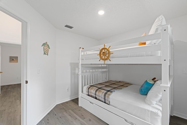 110 Dory Rd, Saint Augustine, FL 32086 - bedroom featuring light wood-style floors, baseboards, and recessed lighting