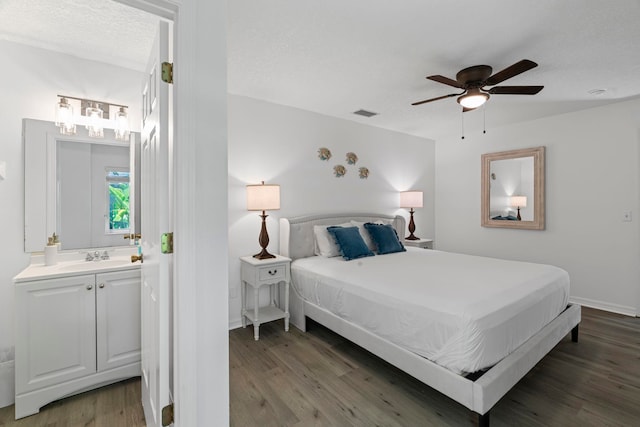 110 Dory Rd, Saint Augustine, FL 32086 - bedroom featuring wood finished floors, a sink, a ceiling fan, and baseboards