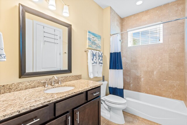 full bathroom with tile patterned flooring, vanity, toilet, and shower / bathtub combination with curtain