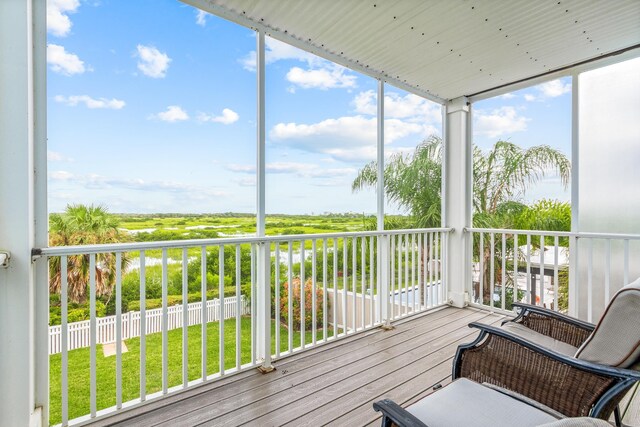 sunroom / solarium with plenty of natural light