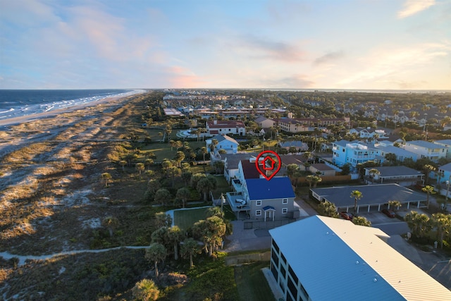 aerial view at dusk with a water view