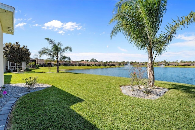 view of yard with a water view