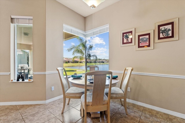 tiled dining space with baseboards