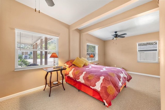 bedroom featuring lofted ceiling, ceiling fan, and carpet