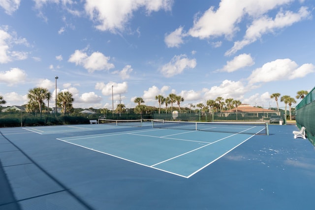 view of sport court with fence