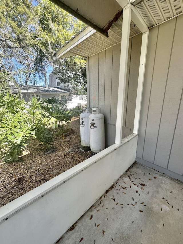 details featuring board and batten siding and heating fuel