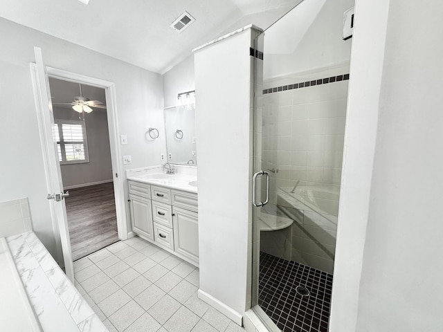 full bathroom with baseboards, visible vents, double vanity, a sink, and a shower stall