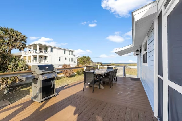 wooden deck featuring area for grilling