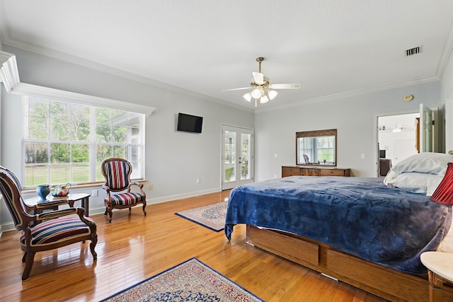 bedroom with hardwood / wood-style flooring, visible vents, baseboards, access to outside, and crown molding