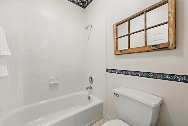 bathroom with toilet and shower / bathtub combination