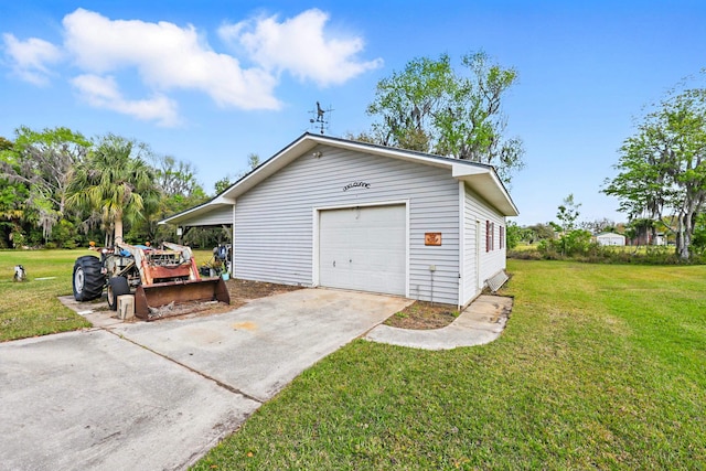 garage with concrete driveway