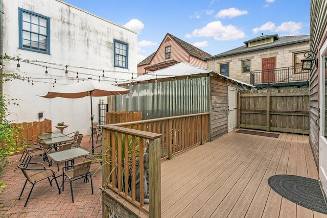 47 Cordova St, Saint Augustine, FL 32084 - wooden deck featuring fence and outdoor dining area