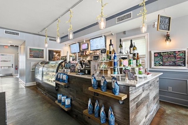 bar with decorative light fixtures