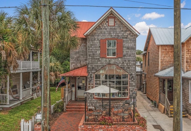 47 Cordova St, Saint Augustine, FL 32084 - back of property featuring a standing seam roof and metal roof