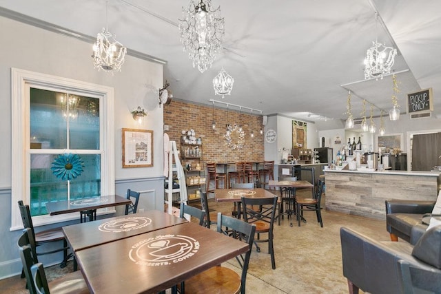 dining area featuring crown molding