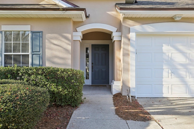 property entrance featuring a garage