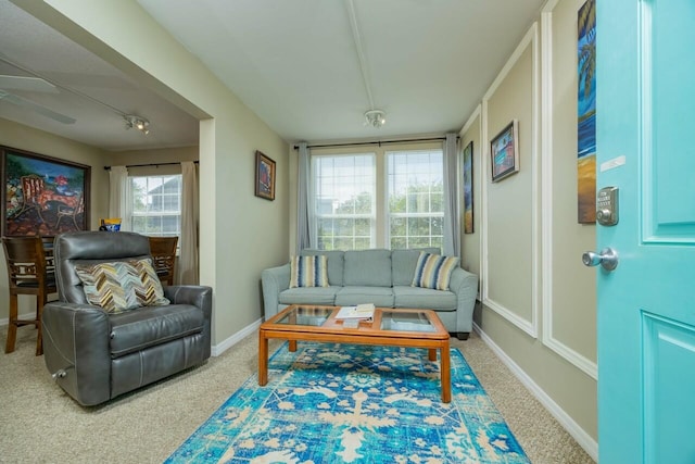 232 Riberia St, Saint Augustine, FL 32084 - carpeted living room featuring baseboards