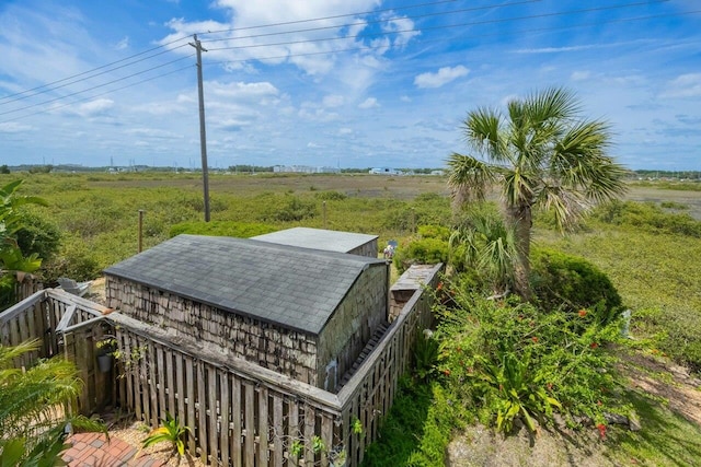 232 Riberia St, Saint Augustine, FL 32084 - wooden terrace featuring a rural view and an outbuilding