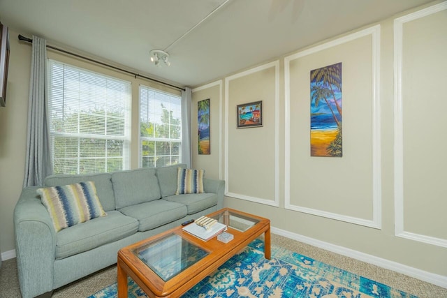 232 Riberia St, Saint Augustine, FL 32084 - living room with baseboards and carpet floors