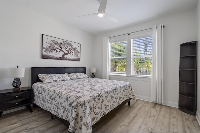 bedroom featuring ceiling fan and light wood-type flooring