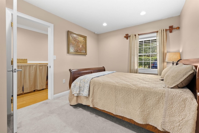 bedroom featuring carpet, baseboards, and recessed lighting