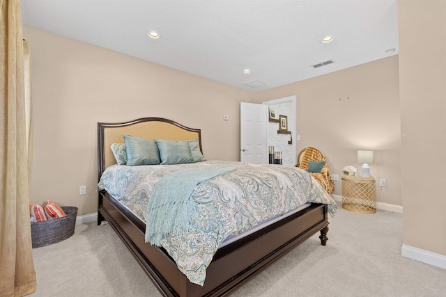 carpeted bedroom featuring recessed lighting, baseboards, and visible vents