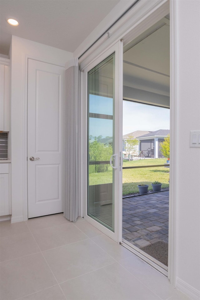 166 Fairlake Cir, Saint Augustine, FL 32092 - doorway with light tile patterned floors, healthy amount of natural light, and recessed lighting