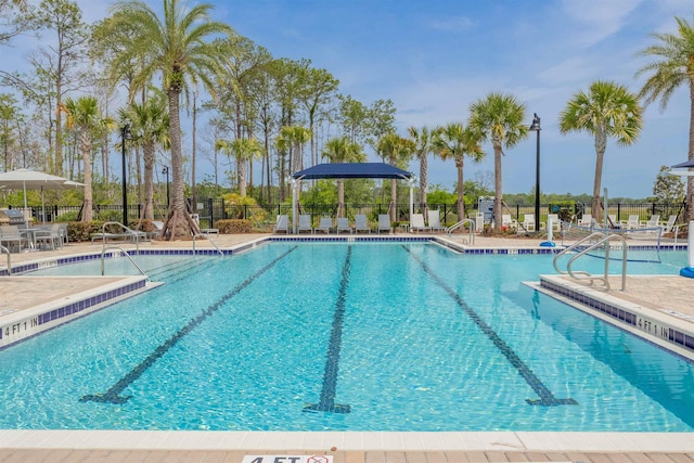 166 Fairlake Cir, Saint Augustine, FL 32092 - community pool with fence and a patio area