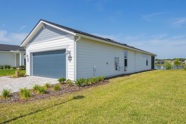 166 Fairlake Cir, Saint Augustine, FL 32092 - view of home's exterior featuring a yard, a garage, and driveway