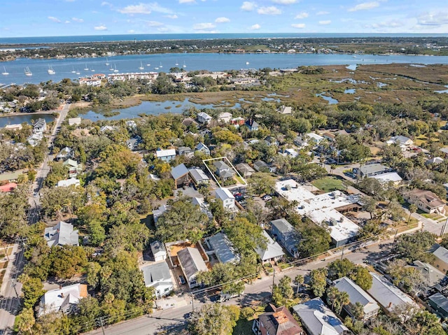 bird's eye view with a water view and a residential view