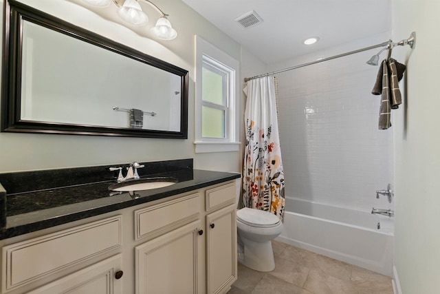 161 Blanco St, Saint Augustine, FL 32084 - full bath with visible vents, shower / bathtub combination with curtain, toilet, vanity, and tile patterned flooring
