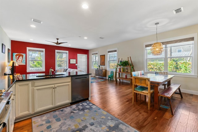 161 Blanco St, Saint Augustine, FL 32084 - kitchen with a sink, dark countertops, wood-type flooring, and dishwasher