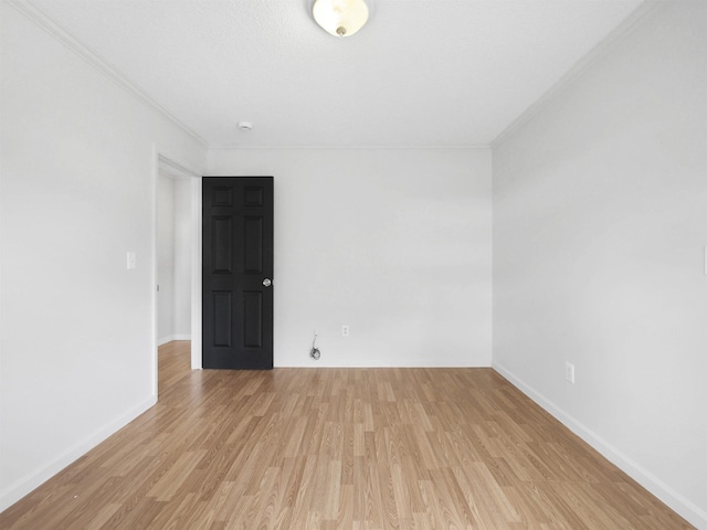 50 Spring St, Saint Augustine, FL 32084 - unfurnished room featuring ornamental molding and light wood finished floors