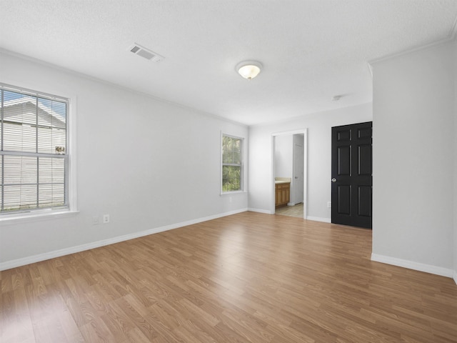 50 Spring St, Saint Augustine, FL 32084 - unfurnished room with light wood-style flooring and baseboards