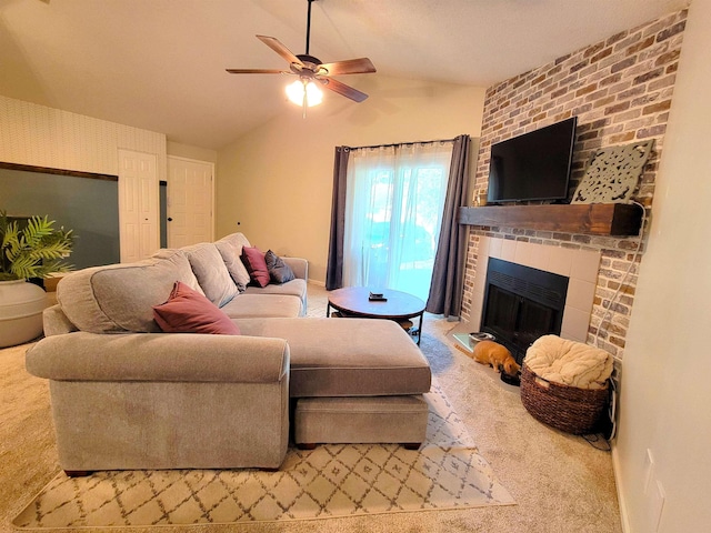 living room with carpet flooring, ceiling fan, and vaulted ceiling