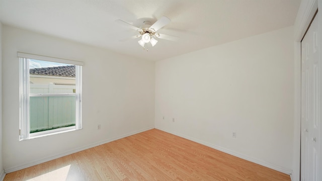 53 Pritchard Dr, Palm Coast, FL 32164 - spare room with light wood finished floors and a ceiling fan