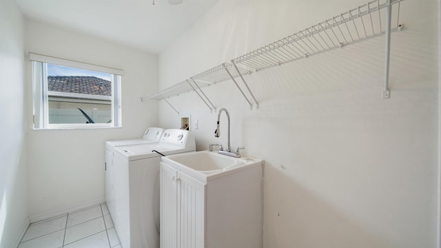 53 Pritchard Dr, Palm Coast, FL 32164 - laundry room featuring washer and dryer and light tile patterned floors
