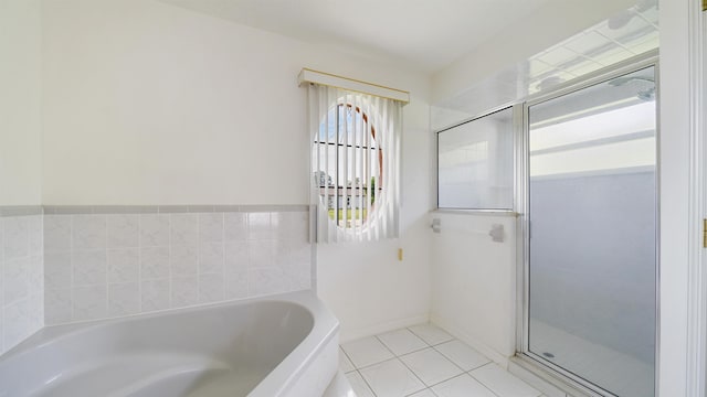53 Pritchard Dr, Palm Coast, FL 32164 - bathroom with a garden tub, tile patterned floors, and a shower stall