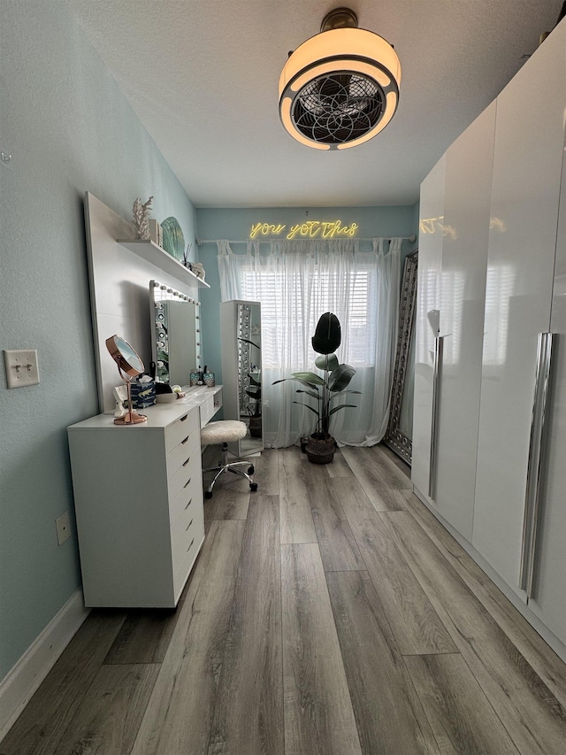 home office featuring hardwood / wood-style flooring