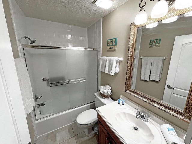 full bath with toilet, enclosed tub / shower combo, vanity, and a textured ceiling