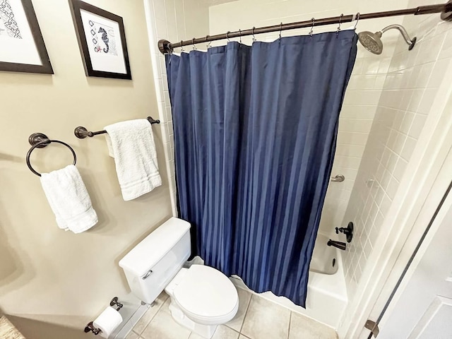 full bath featuring shower / tub combo with curtain, toilet, and tile patterned floors