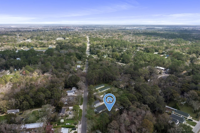 drone / aerial view with a view of trees