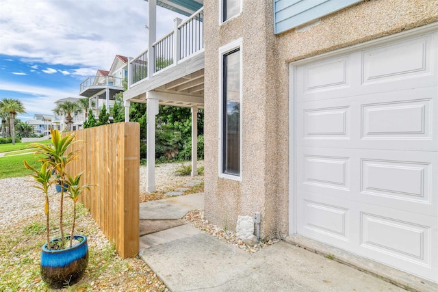 view of home's exterior with a balcony